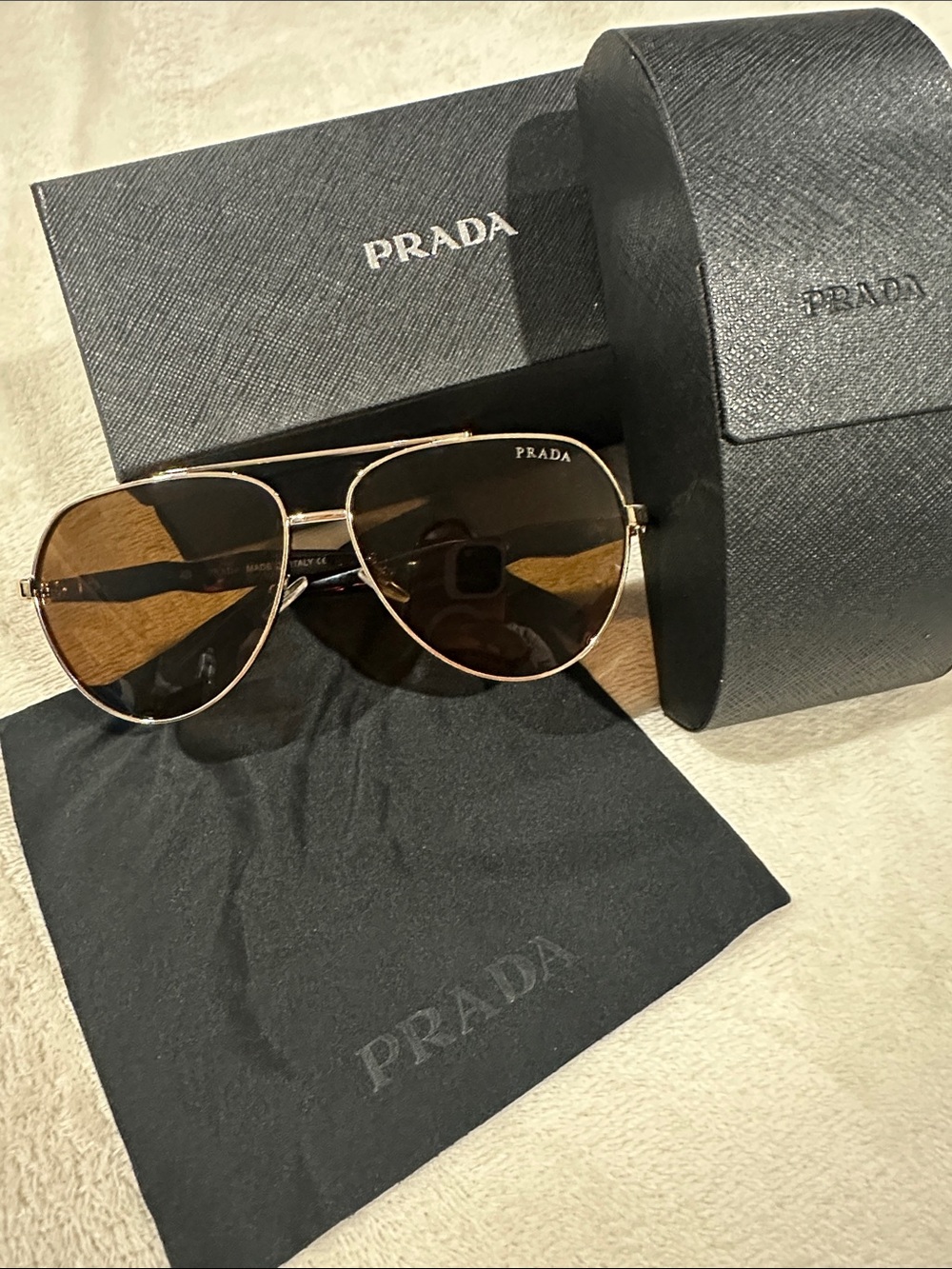 Prada women’s Gold Frame Sunglasses with Brown Lenses - Picture 1 of 4